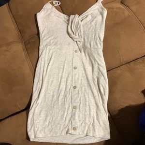 Size S tight fitted dress beige color super cute (worn / like new) no stains